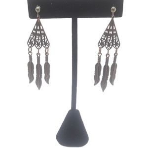 Copper triangle cutout earrings, dangling feathers